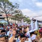 Pasangan calon gubernur dan wakil gubernur Lampung, Rahmat Mirzani Djausal (RMD) dan Jihan Nurlela, resmi mendaftarkan diri ke Komisi Pemilihan Umum (KPU) Lampung. Foto : Wildanhanafi/berandalappung.com