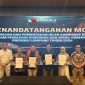 Penandatanganan MoU iklan Kampanye di Media Massa yang diselenggarakan oleh Bawaslu Lampung. Foto: Wildanhanafi/berandalappung.com