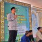Riza Fahlevi disaat memberikan sambutan di acara milad ke-30 Ponpes Al Mu'awanah di Pesawaran. 