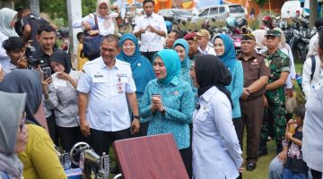 Kejari Way Kanan Hadiri Pencanangan Desa Tapis dan Penyaluran Bantuan TP PKK Provinsi Lampung di Kampung Negeri Baru